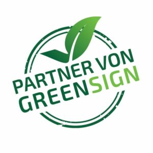 Das Logo von Green Sign, eine grüne Pflanze in einem grünen Kreis